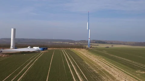 Giant wind turbines being constructed in Germany. Aerial shot. Video stock 73123696