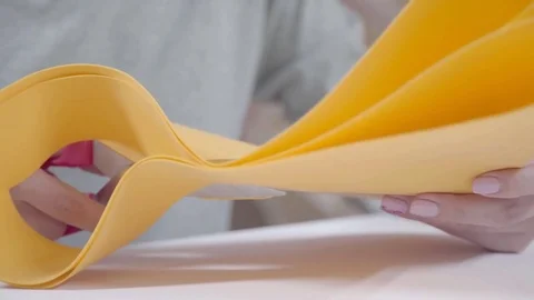Giant yellow paper flowers: the process of creating Stock Footage 71762477