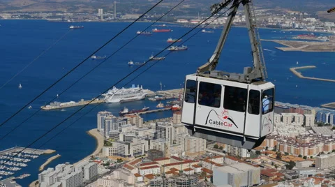 The Gibraltar Cable car descending. City in background Stock Footage