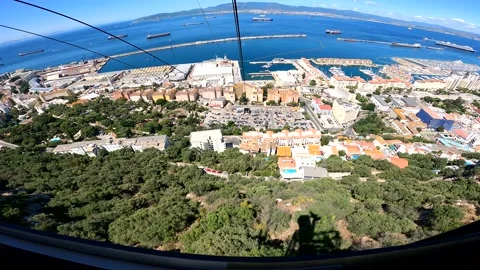 Gibraltar cable car going down with indistinct chatter Stock Footage 201786417