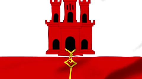 Gibraltar flag featuring red castle and golden key symbol Vídeos de archivo 343574057