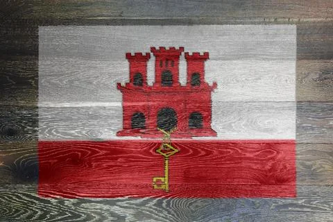 Gibraltar flag on rustic old wood Stock Illustration