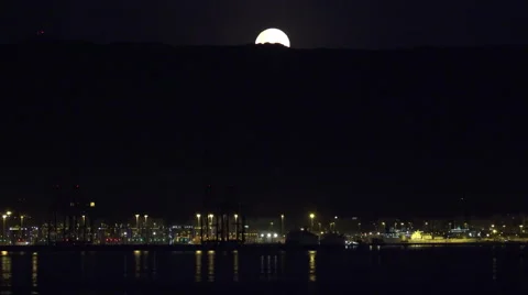 Gibraltar moon heading under cloud Stock Footage 62722839