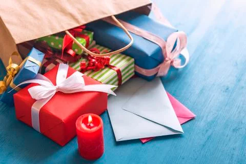 Gift bag overturned on the table Stock Photos
