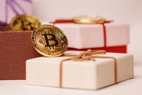 Gift bitcoin in the package Stock Photos