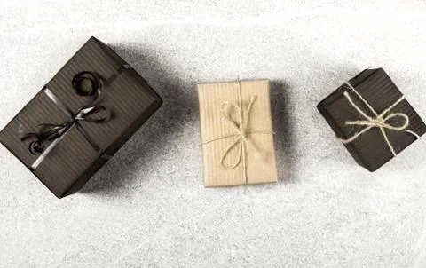 Gift black and brown boxes on white textures surface. Top view. Stock Photos