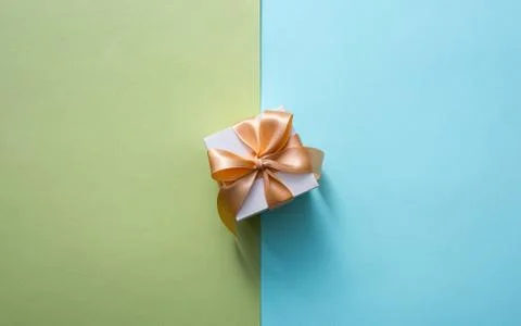 Gift box from above over two color background 写真素材