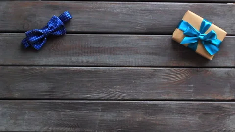 Gift box and coffee for man. Happy fathers day. Present on birthday. Top view Stock Footage 131568860