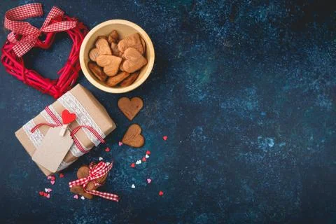 Gift box with and cookies in the shape of heart. Stock Photos