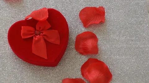 Gift Box and Falling Rose Petals Stock Footage 46520954