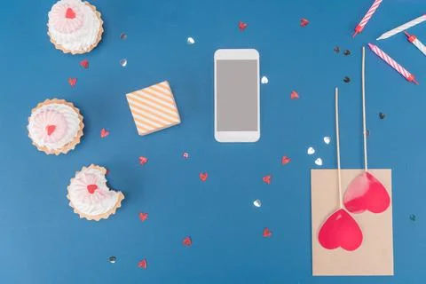 Gift box and smartphone Stock Photos