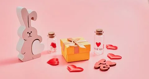 Gift box with beautiful red ribbon and rose, concept of Valentine's, annivers Stock Photos