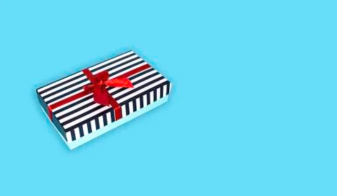 A gift box with a bow. Stock Photos