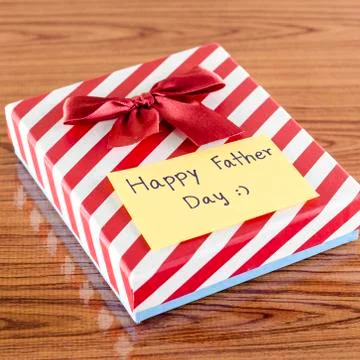 Gift box with card write happy father day Stock Photos