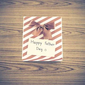 Gift box with card write happy father day Stock Photos
