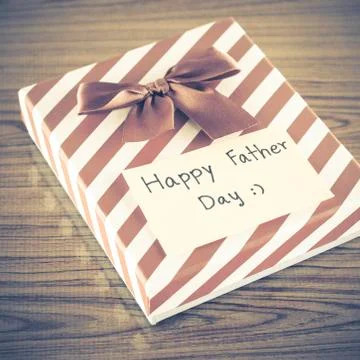 Gift box with card write happy father day Stock Photos