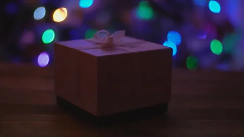 Gift box for christmas tree backgrounds Stock Footage 104852310