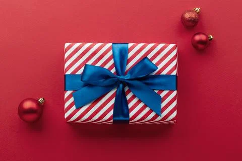 Gift box on color background, flat lay, space for text Stock Photos