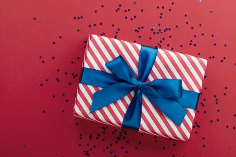 Gift box on color background, flat lay, space for text Stock Photos