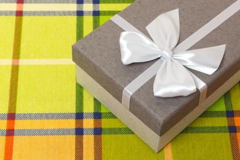 Gift box on the color table Stock Photos