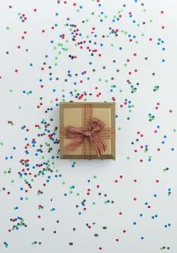 Gift box with confetti Stock Photos