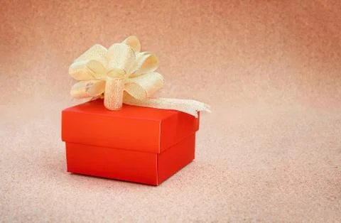 Gift box on the cork background Stock Photos