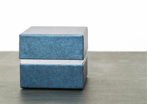 Gift box on dark background Stock Photos