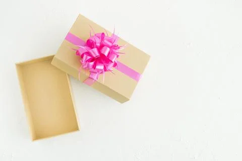 Gift box with decorations on a white background. Copy space. Foto stock