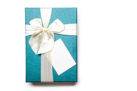 Gift box with empty white blank gift tag mock up. Christmas, birthday or wedding Stock Photos