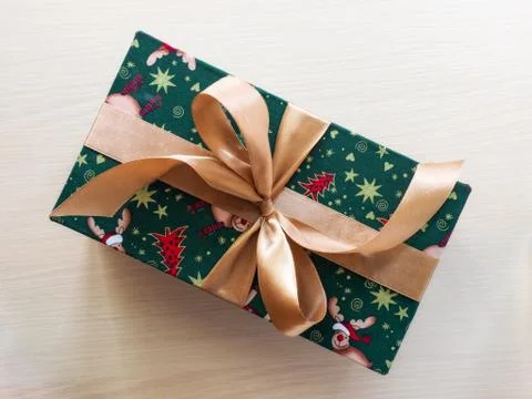 Gift box on the floor Stock Photos