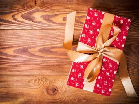 Gift box on the floor Stock Photos