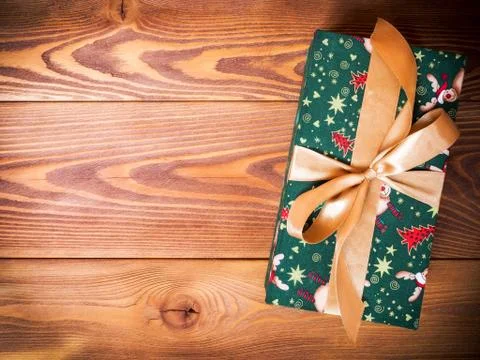 Gift box on the floor Stock Photos
