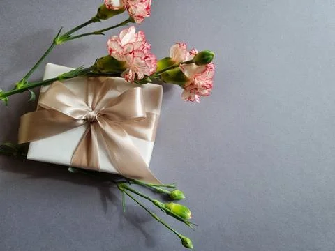 Gift box with flowers Stock Photos