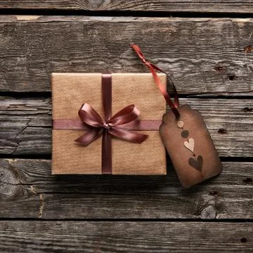 Gift box with gift tag Stock Photos