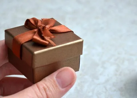 Gift box in hand	 Stock Photos