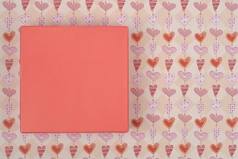 Gift Box on Heart Pattern Stock Photos