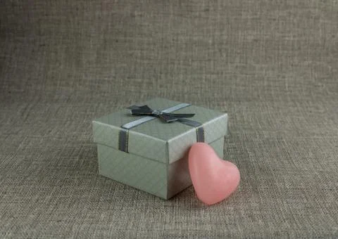 Gift box with a heart Stock Photos