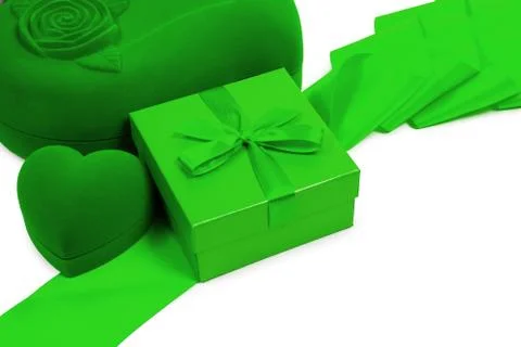 Gift box, heart ring gift box and green ribbon isolated on white Stock Photos