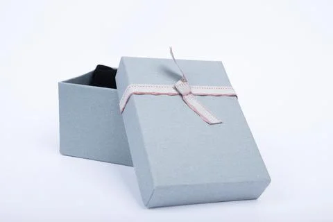 Gift box with a heart shape isolated on white background. Stock Photos