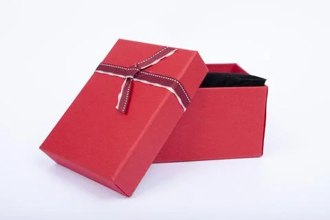 Gift box with a heart shape isolated on white background. Stock Photos