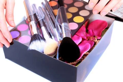 Gift box with makeup inside Stock Photos