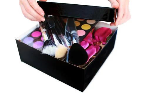 Gift box with makeup inside Stock Photos