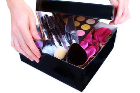 Gift box with makeup inside Stock Photos