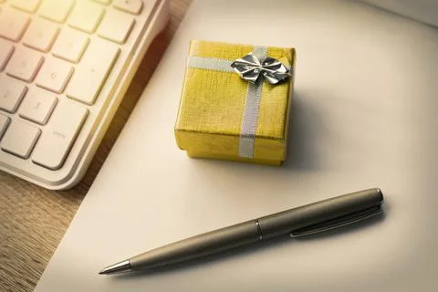 Gift box with notebook and computer Foto stock