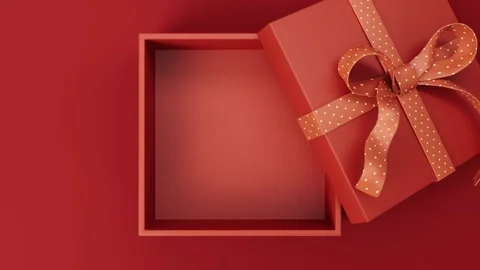 Gift box opening revealing empty interior on red background dynamic motion Stock Footage 327517344