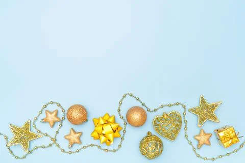 Gift box or present box with golden star and ball on blue background for birt Stock Photos