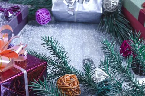 Gift box with pine branches on blue background Stock Photos