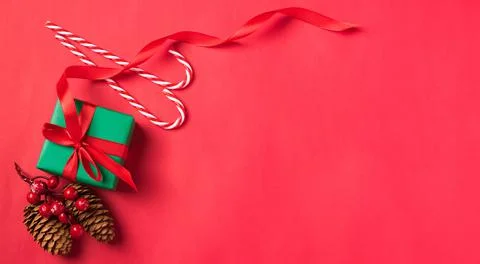 Gift box, pine cones and candy Xmas decoration Stock Photos