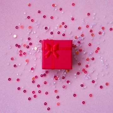 Gift box on a pink background. Stock Photos