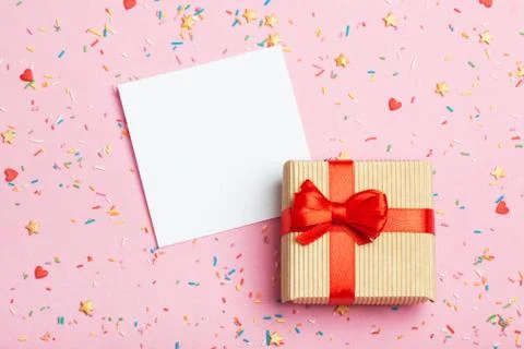 A gift in a box on a pink background Foto stock